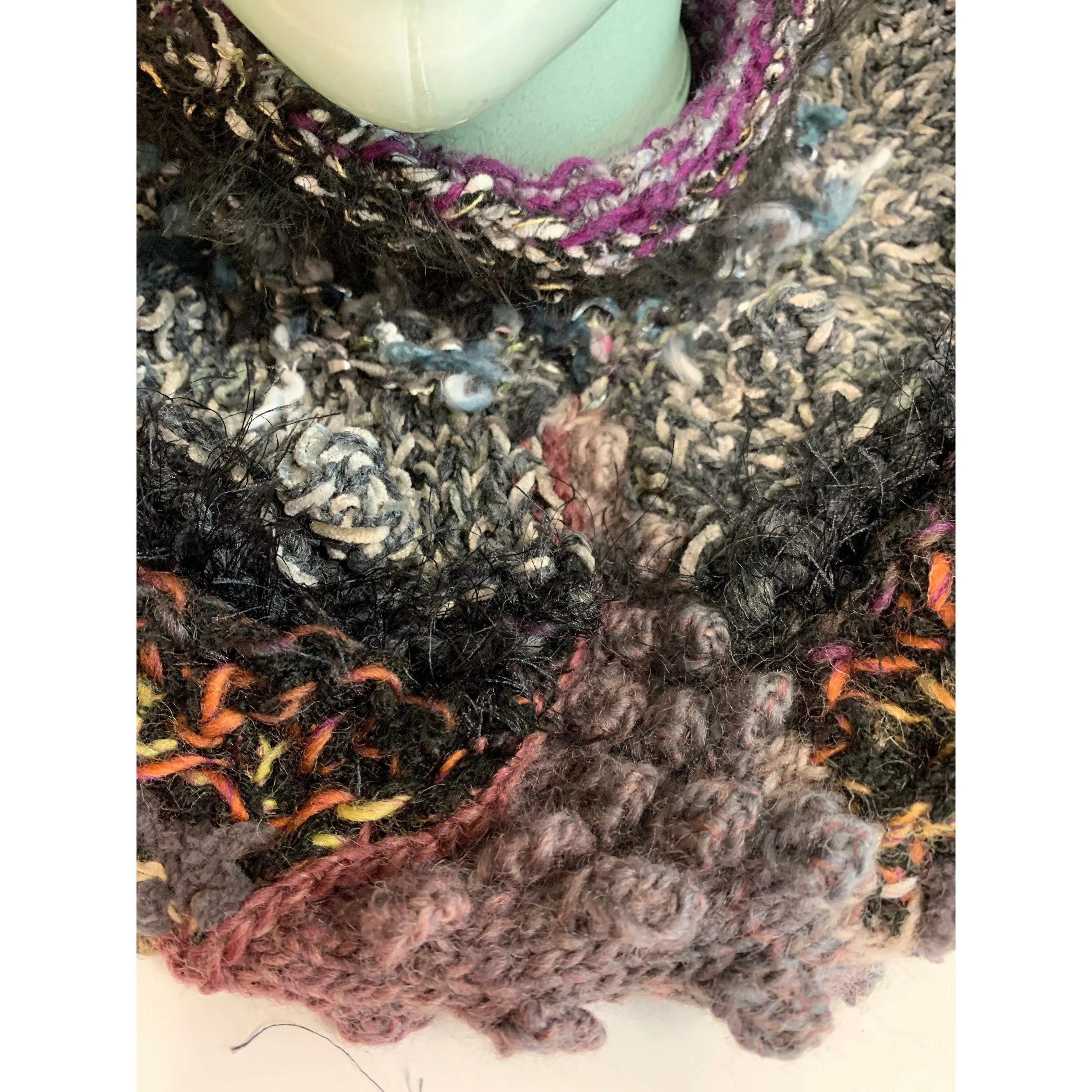 Hand knit in one piece soft infinity shoulder wrap adornment with multiple stitch and color textures. Winter scarf.