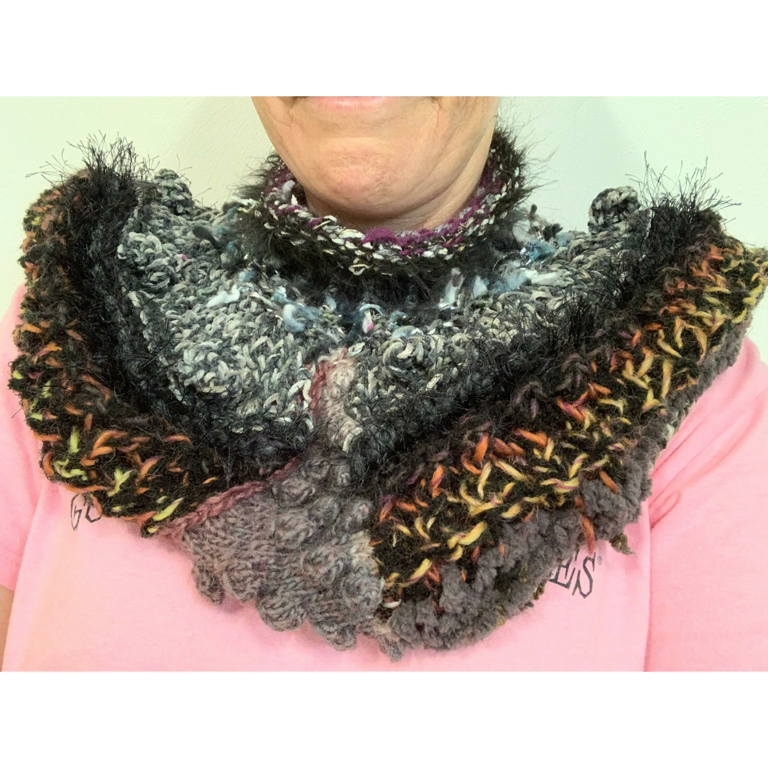 Hand knit in one piece soft infinity shoulder wrap adornment with multiple stitch and color textures. Winter scarf.