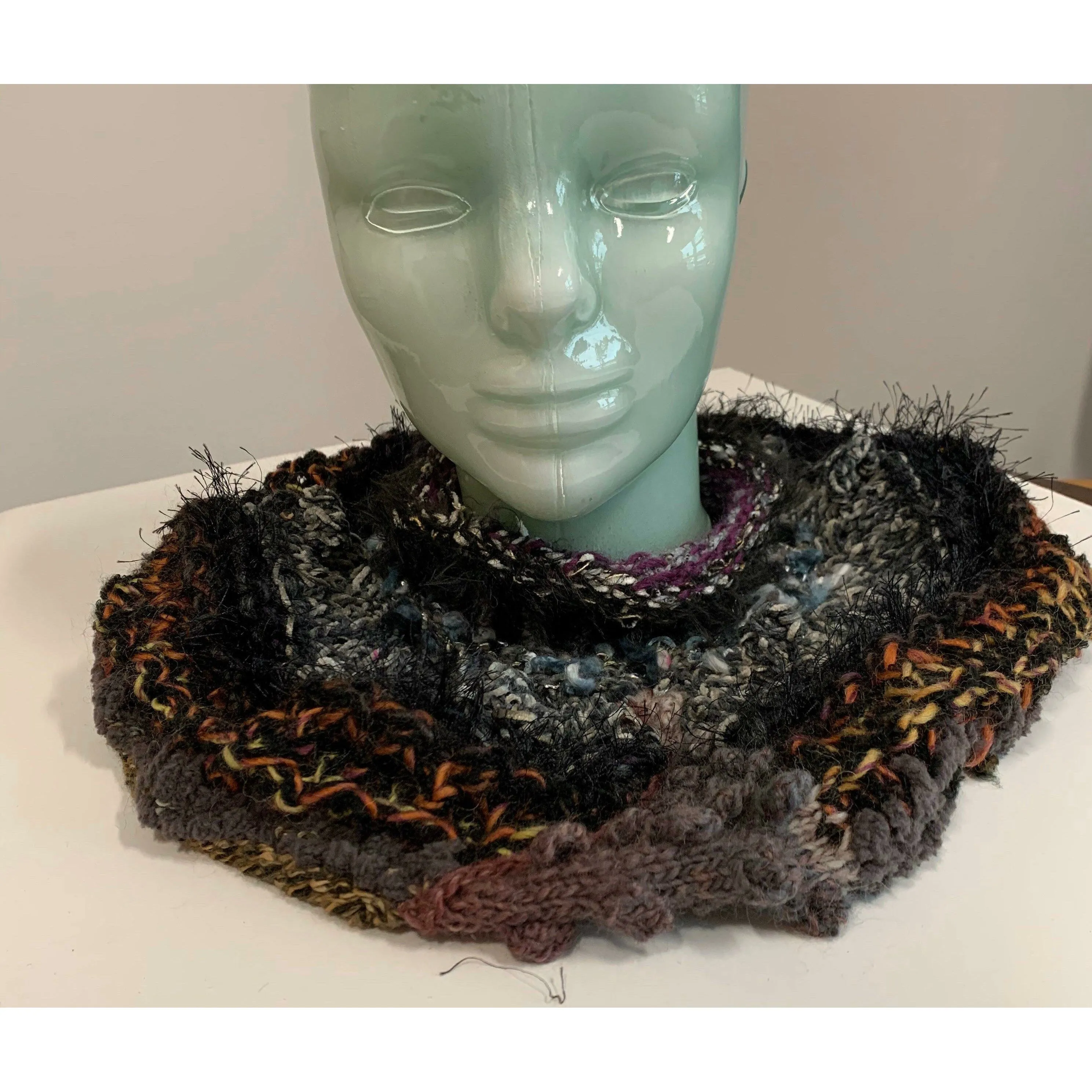 Hand knit in one piece soft infinity shoulder wrap adornment with multiple stitch and color textures. Winter scarf.